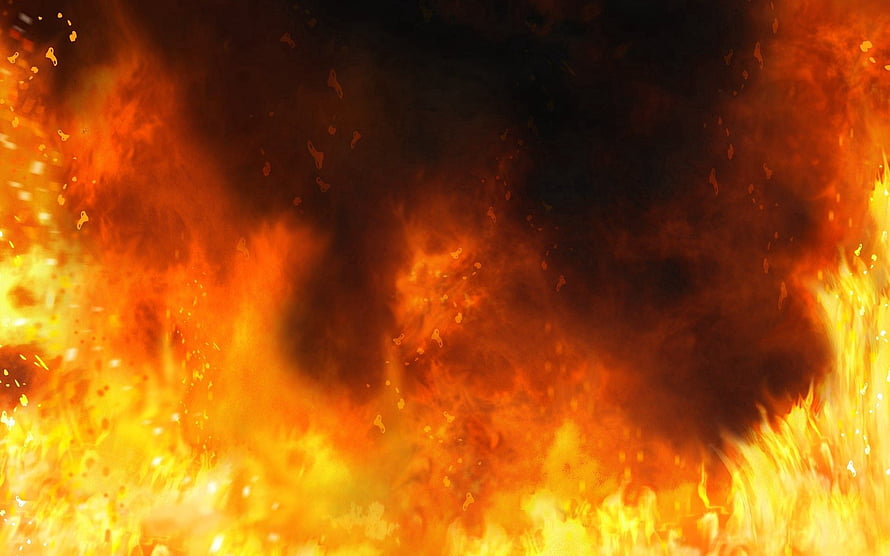 Intense Fire and Flame Explosion with Dark Smoke and Bright Orange Sparks HD wallpaper