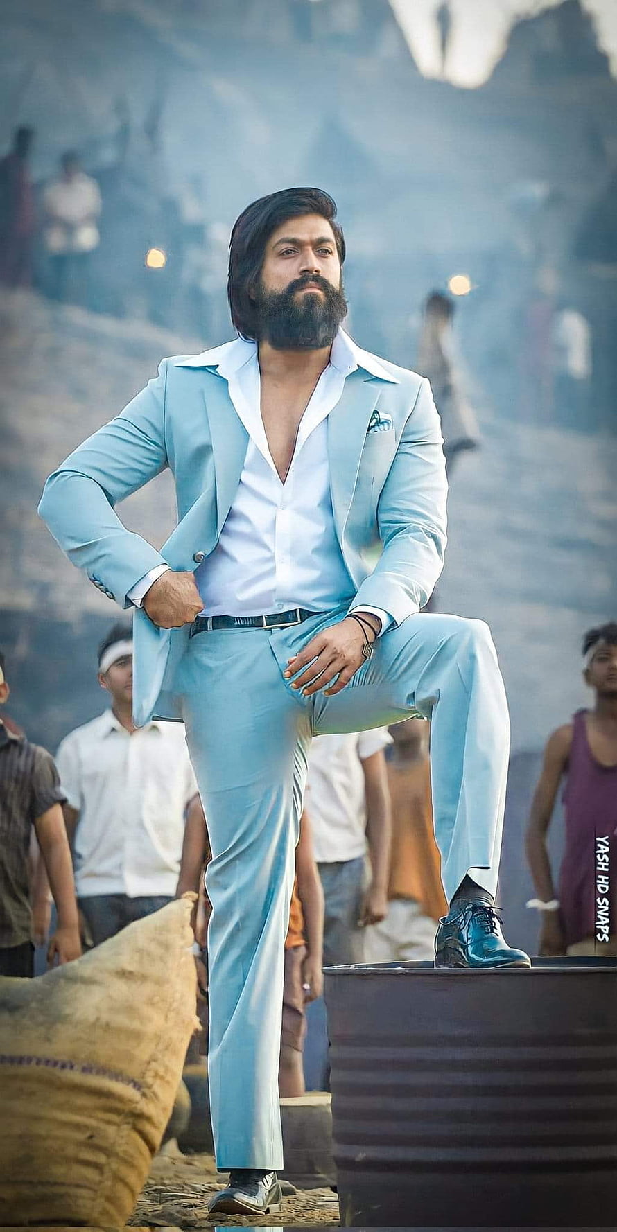 Allu Arjun in a light blue suit from Pushpa 2 The Rule movie still HD phone wallpaper