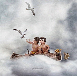 Baby Ganesha and Krishna Sitting on a Scroll with Flying Seagulls HD wallpaper