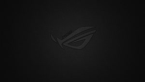 Asus ROG Strix Gaming Logo on Dark Textured Background HD wallpaper