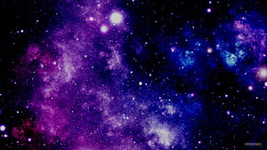 Vibrant Purple and Blue Nebula Clouds in Deep Space with Scattered Stars HD wallpaper