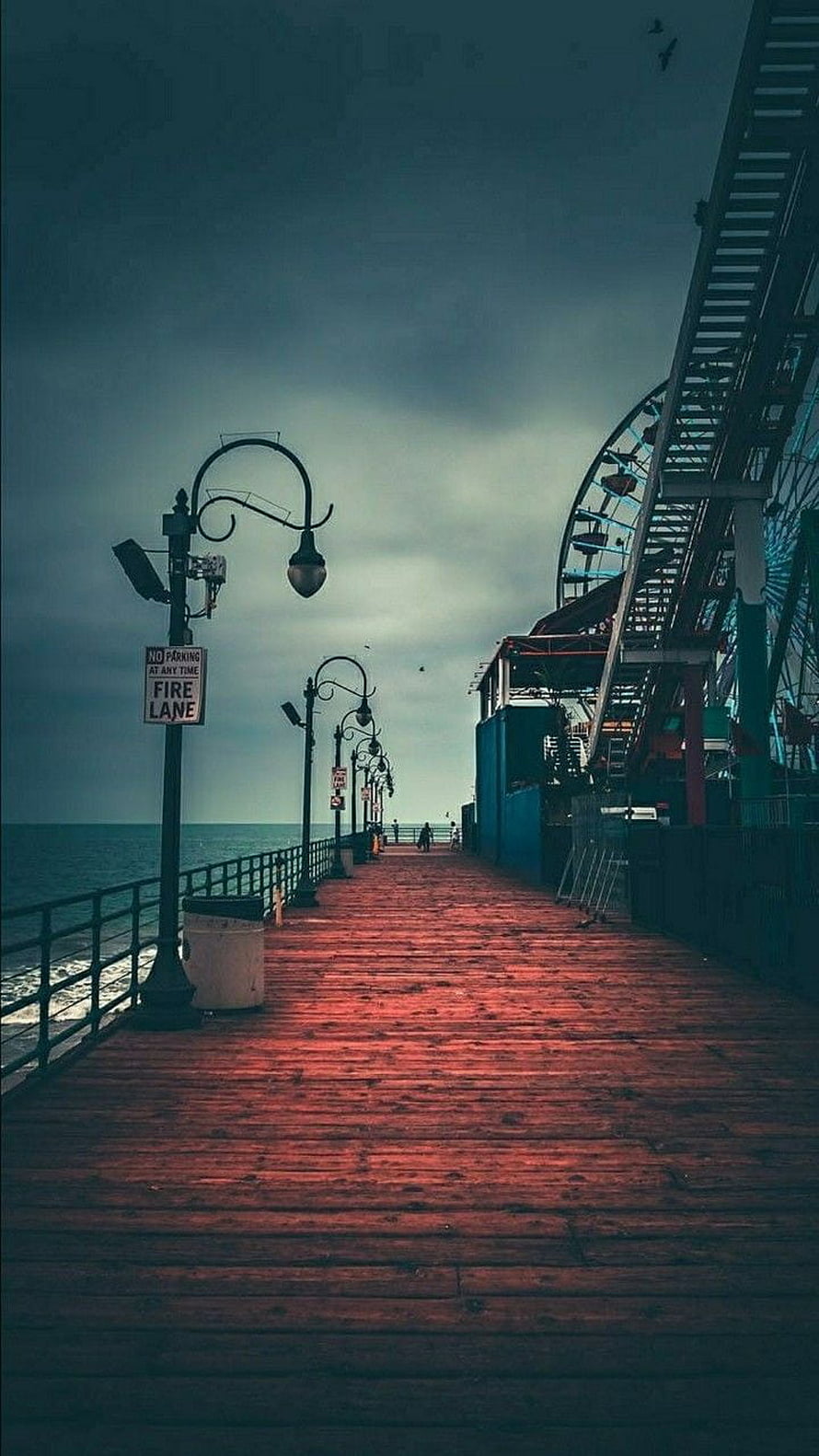 Moody Wooden Boardwalk Pier With Ferris Wheel And Ocean View HD phone wallpaper