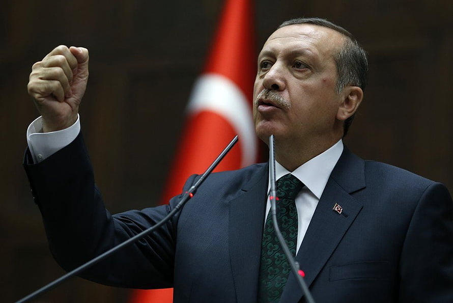 Recep Tayyip Erdogan Speaking at a Formal Political Address with Turkish Flag HD wallpaper