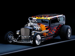Classic Hot Rod with Flame Paint Job and Exposed V8 Engine on Black Background HD wallpaper