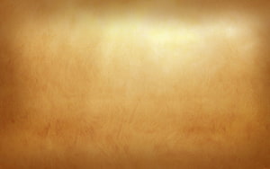 Vintage Parchment Paper Texture Background With Warm Golden Lighting And Subtle Grain Details HD wallpaper