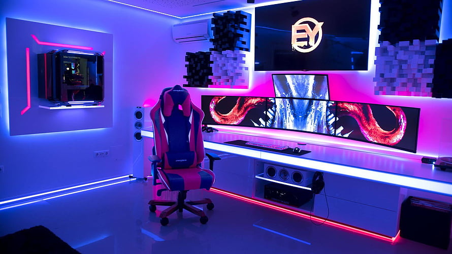 Modern Neon Gaming Setup With RGB LED Lighting, Triple Monitor Array, and Custom PC Build HD wallpaper