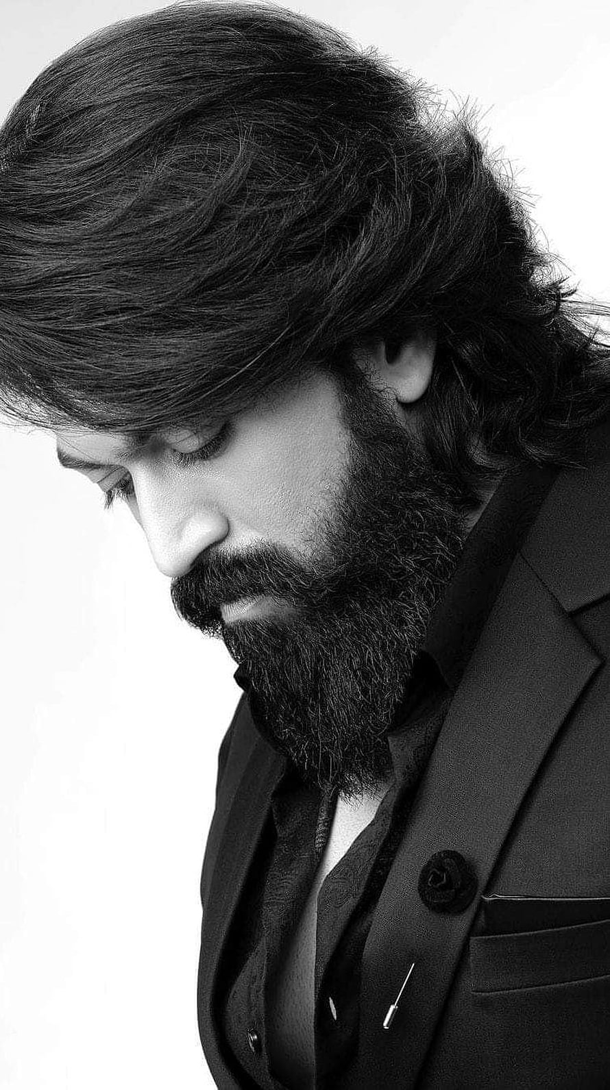 Yash in KGF Black and White Portrait with Full Beard and Dark Suit HD phone wallpaper