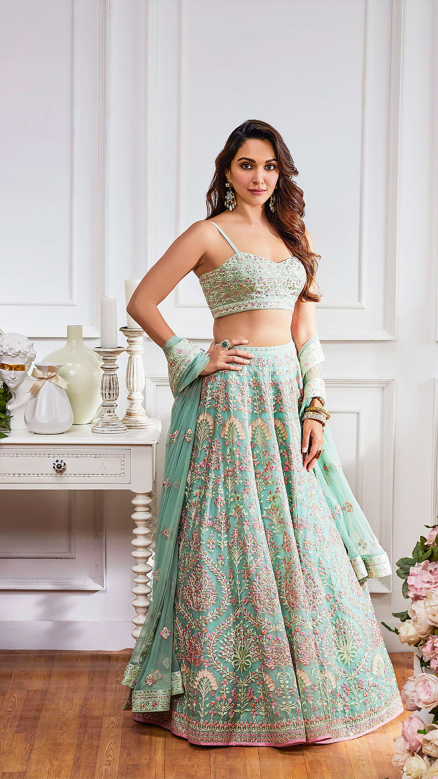 Elegant Mint Green Embroidered Lehenga Choli with Floral Patterns and Dupatta HD phone wallpaper