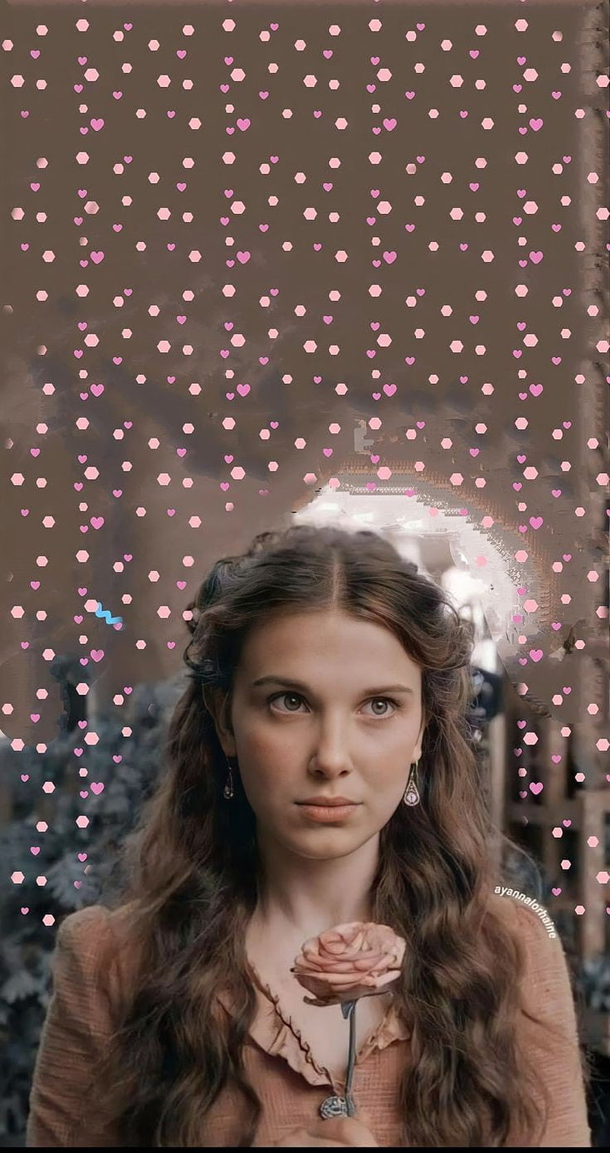 Milly Albuque from Bridgerton holding a rose with pink heart confetti overlay HD phone wallpaper