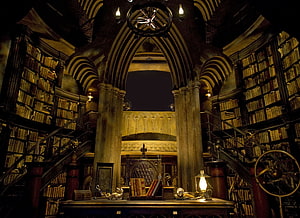 Hogwarts Library Interior with Gothic Arches and Ancient Books HD wallpaper