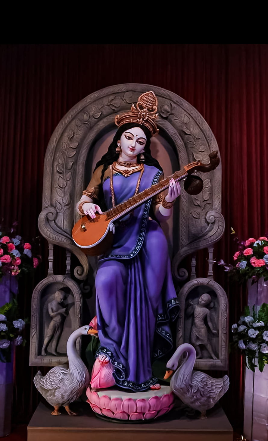 Saraswati Goddess Statue Playing Veena with Swans and Lotus HD phone wallpaper