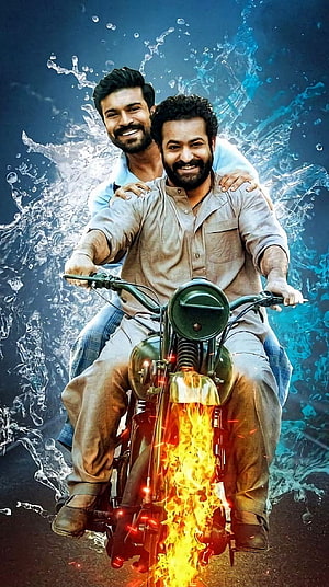 RRR Movie Poster: Two Men Riding a Motorcycle with Fire and Water Effects HD phone wallpaper