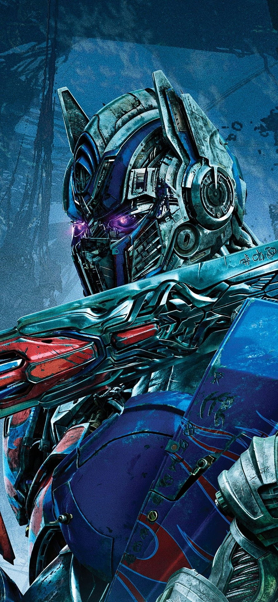Optimus Prime Close-Up Portrait with Glowing Purple Eyes and Weathered Blue Armor HD phone wallpaper