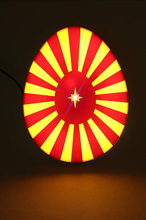 Glowing Red and Yellow Sunburst Star Pattern Light Lamp HD phone wallpaper
