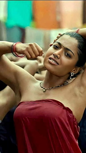 Woman in Red Strapless Top with Intense Expression and Raised Arms, Rashmika mandanna, pushpa, sami sami HD phone wallpaper