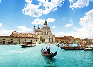 Gondola on the Grand Canal in Venice with Santa Maria della Salute Church HD wallpaper