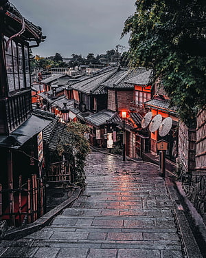 Atmospheric View of Traditional Japanese Street with Stone Steps and Lanterns HD phone wallpaper