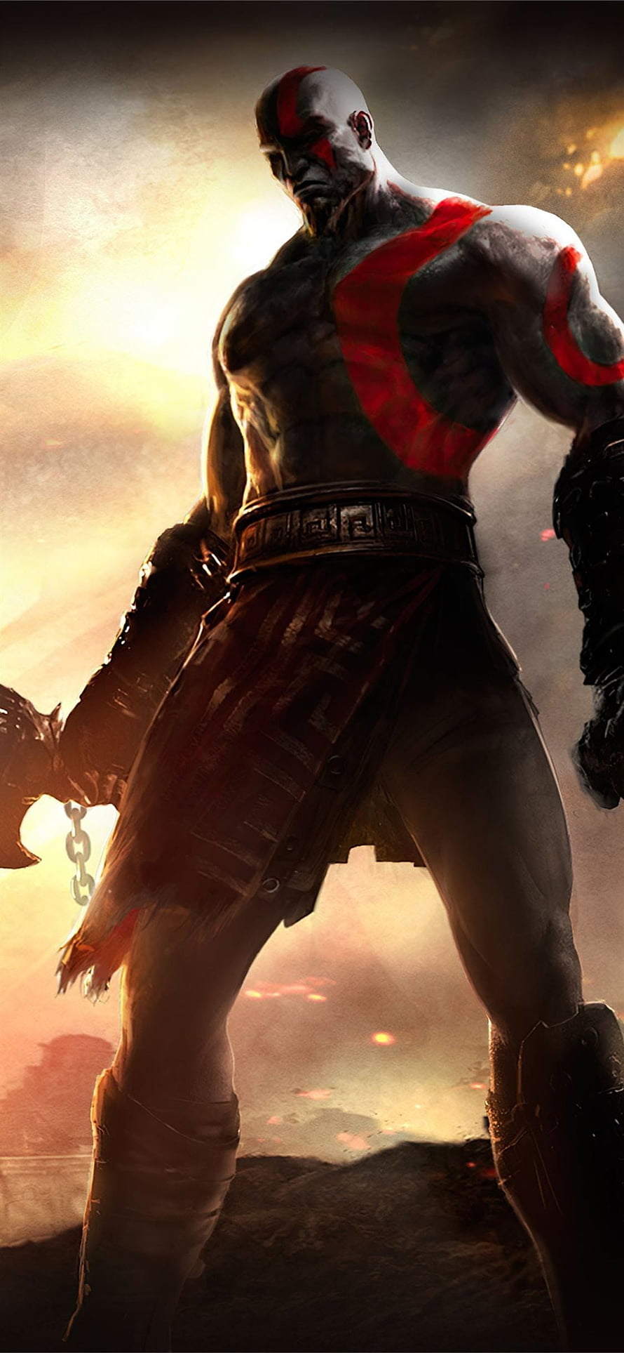 Kratos from God of War standing in a fiery battlefield with glowing red tattoos and battle-worn armor HD phone wallpaper