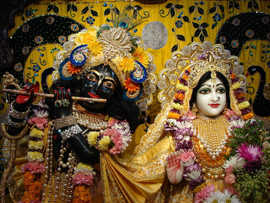 Radha Krishna Deities Adorned in Flowers and Jewels HD wallpaper