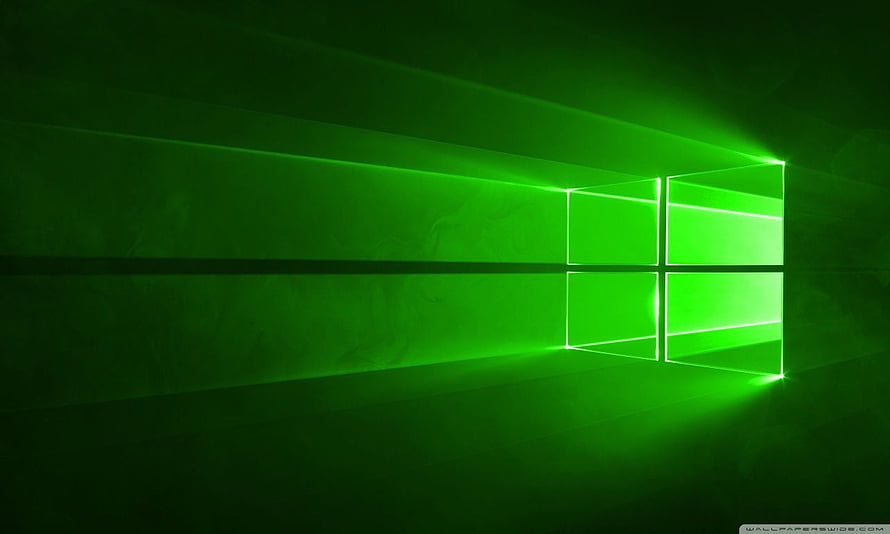 Glowing Green Windows 10 Logo on Dark Textured Wall HD wallpaper