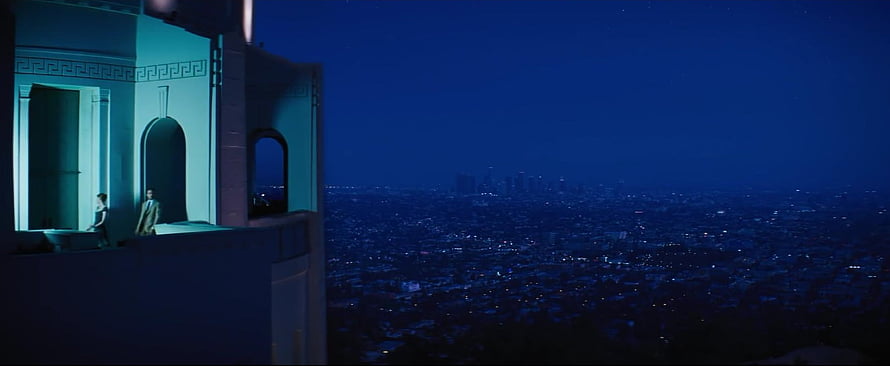 La La Land Rooftop Scene Over Nighttime City Skyline HD wallpaper