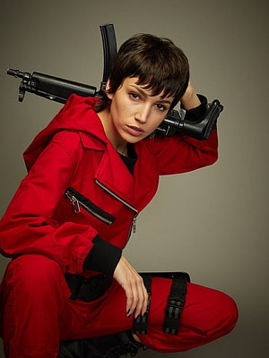 Money Heist Tokyo Character in Red Jumpsuit with Rifle HD phone wallpaper