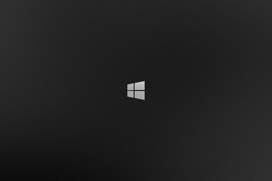 Minimalist Windows 10 Logo on Dark Charcoal Background HD wallpaper
