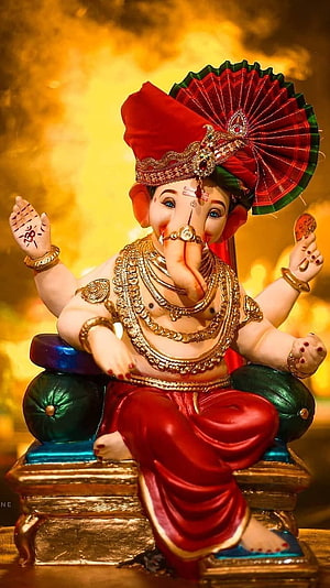 Ganesha Idol With Red Turban And Gold Jewelry Sitting On Throne HD phone wallpaper