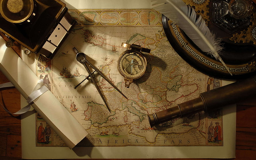 Vintage Navigation Tools on Antique World Map with Compass and Quill HD wallpaper