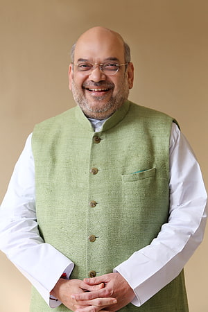 Amit Shah in Green Nehru Jacket and White Kurta with Warm Smile HD phone wallpaper