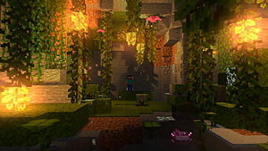 Minecraft lush cave biome with glowing vines, mossy blocks, and a player character exploring the vibrant underground environment HD wallpaper