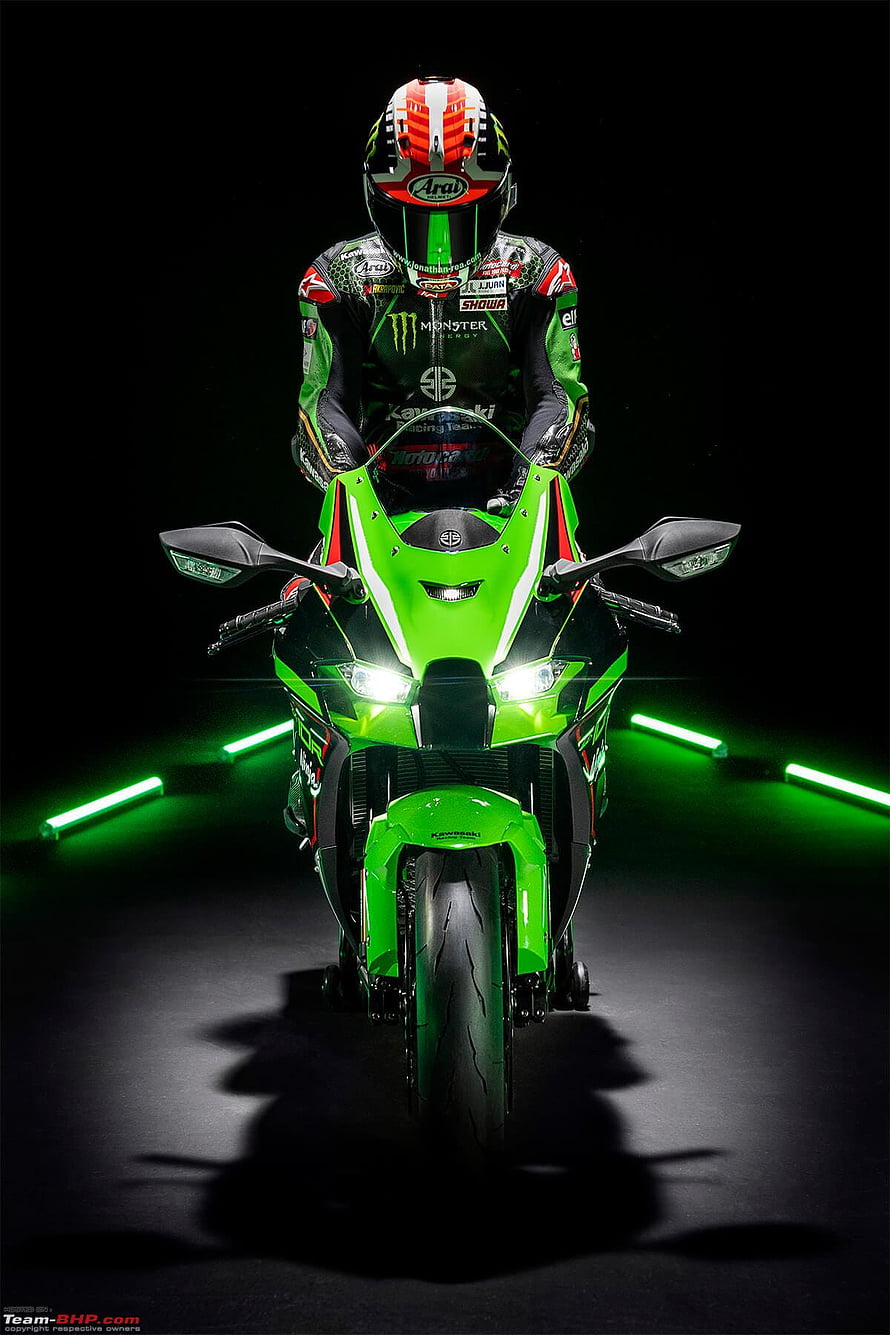 Kawasaki Ninja H2R Superbike with Rider in Green Racing Suit and Neon Lights HD phone wallpaper