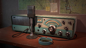 Vintage Amateur Radio Station with Microphone and Maps HD wallpaper