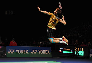 Lee Chong Wei mid-air jump smash during a Yonex sponsored badminton match HD wallpaper