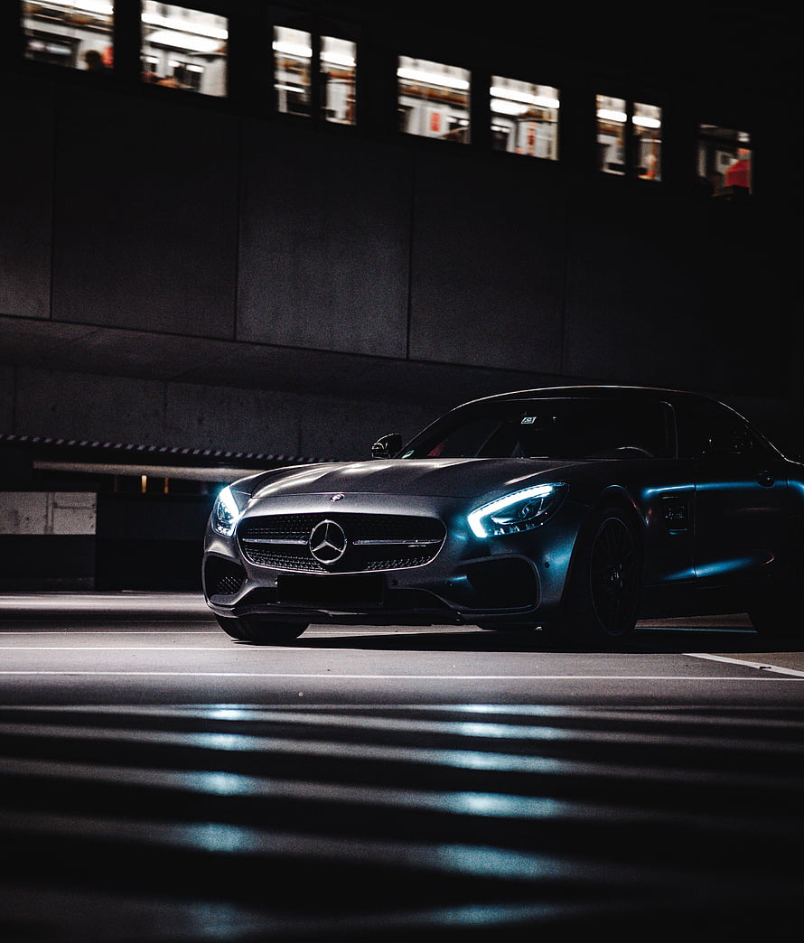 Mercedes-AMG GT Coupe in Matte Grey Parked in a Dark Underground Garage at Night HD phone wallpaper