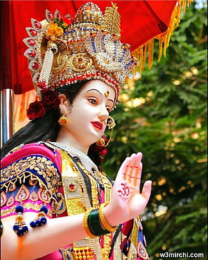 Mata Rani Durga Idol in Ornate Gold Crown and Traditional Attire During Navratri Festival HD phone wallpaper