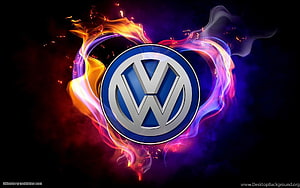 Volkswagen Logo with Fiery Neon Smoke and Glowing Colorful Energy Effects on Dark Background HD wallpaper