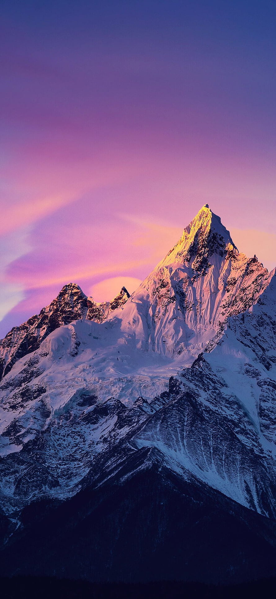 Majestic Snow-Capped Mountain Peak Illuminated by Golden Sunrise Against a Vibrant Purple and Pink Sky HD phone wallpaper