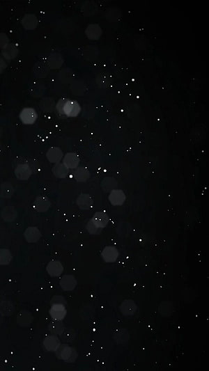Minimalist Dark Starfield with Soft Bokeh Light Orbs on Black Background HD phone wallpaper