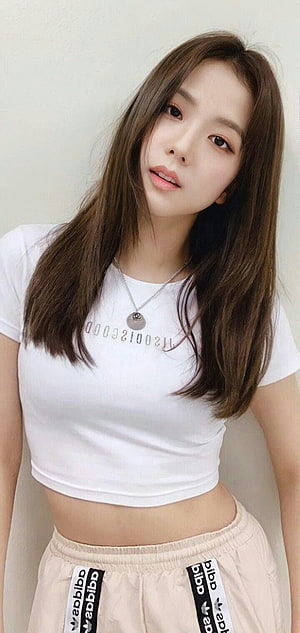 Kim Sohyun in White Crop Top and Beige Sweatpants Portrait HD phone wallpaper