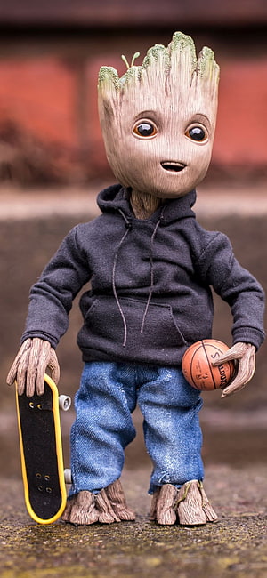 Baby Groot in a hoodie holding a basketball and skateboard HD phone wallpaper