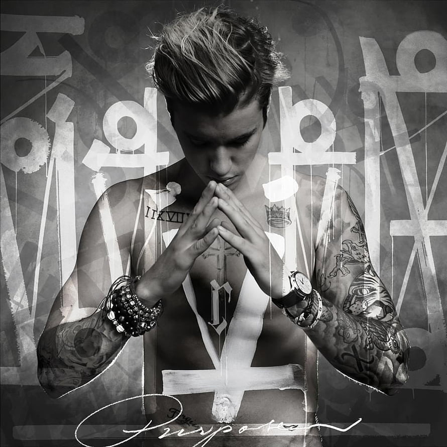 Justin Bieber in Prayer Pose with Cross Tattoo and Gothic Typography HD phone wallpaper