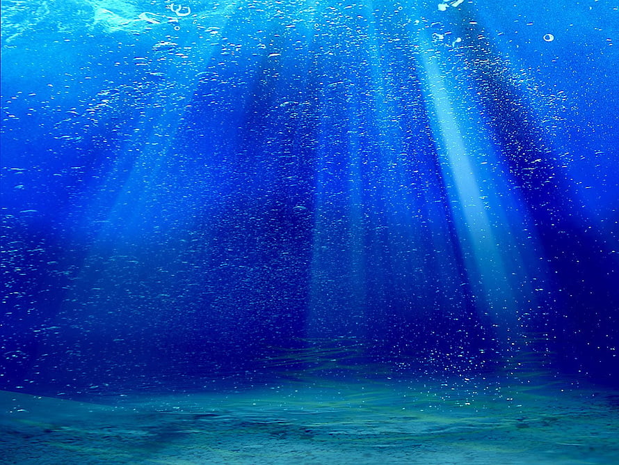 Sunlight Rays Piercing Through Deep Blue Ocean Water With Bubbles HD wallpaper