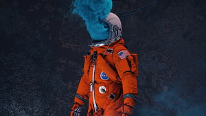 Surreal Astronaut in Orange NASA Space Suit with Blue Smoke Rising from Helmet HD wallpaper