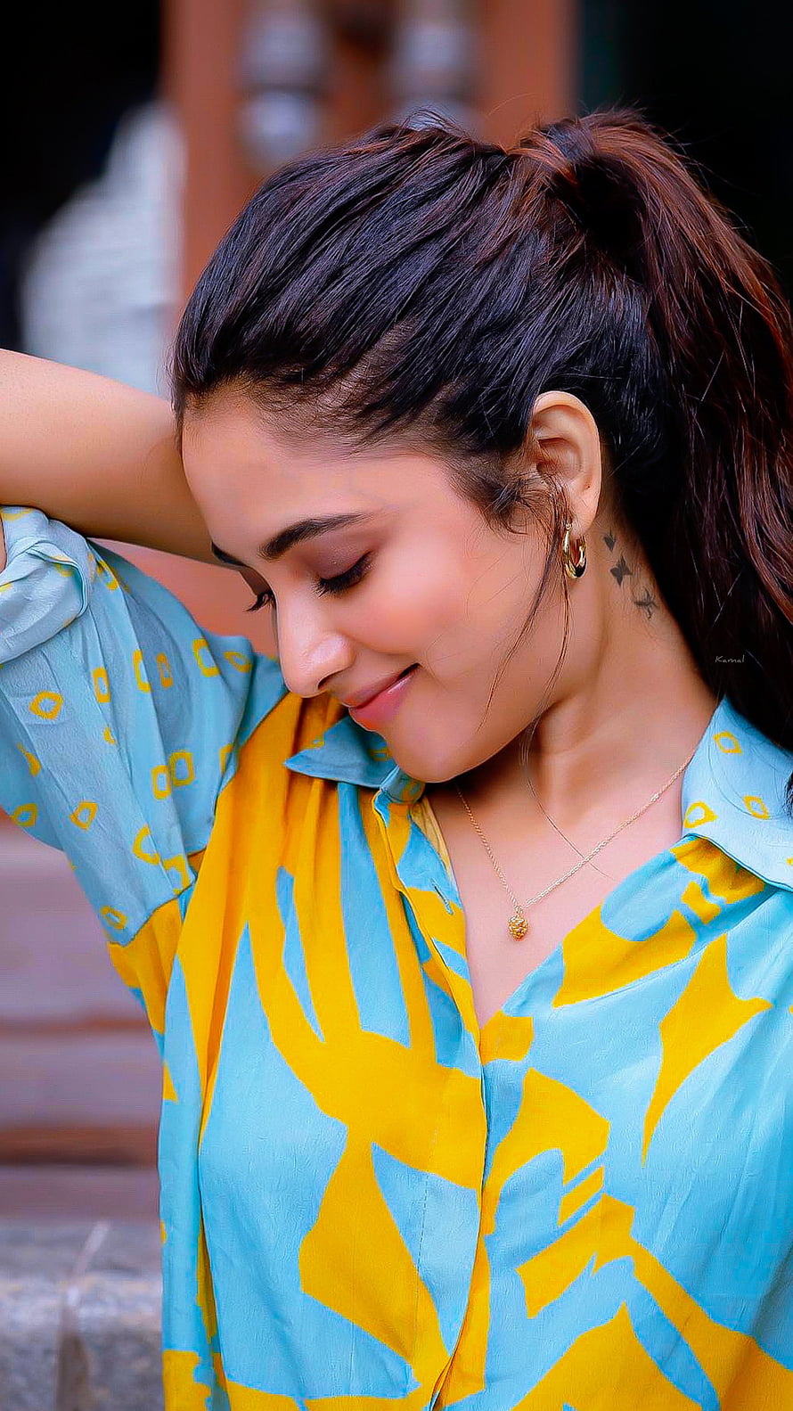 Priyanka Mohan in a vibrant blue and yellow patterned blouse with a high ponytail HD phone wallpaper