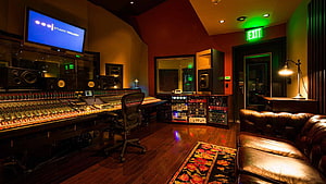 Professional Recording Studio Control Room With Mixing Console And Audio Equipment HD wallpaper