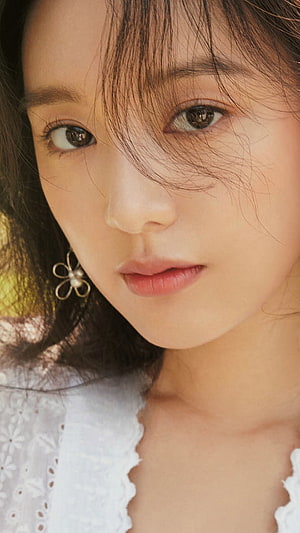 Kim Ji Won Close-Up Portrait With Delicate Flower Earring And Soft Natural Lighting HD phone wallpaper