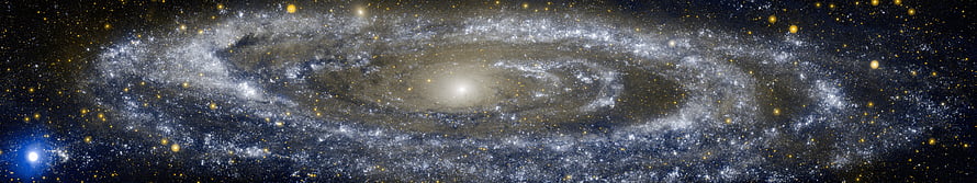 Spiral Galaxy with Bright Core and Dust Lanes in Deep Space HD wallpaper