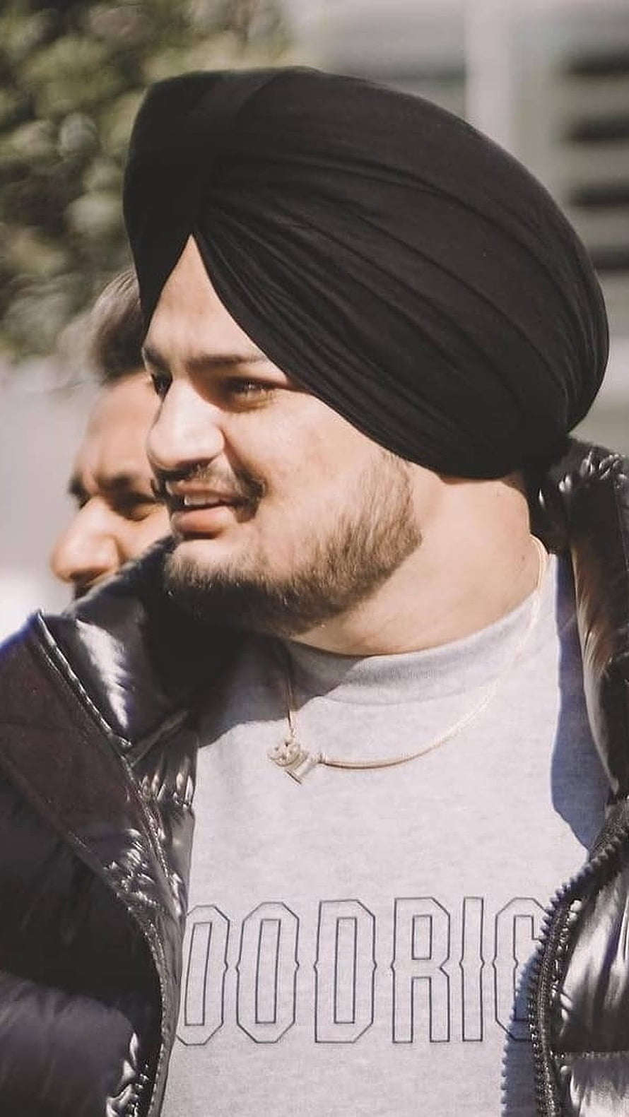 Portrait of Diljit Dosanjh Wearing a Black Turban and Grey Hoodie HD phone wallpaper