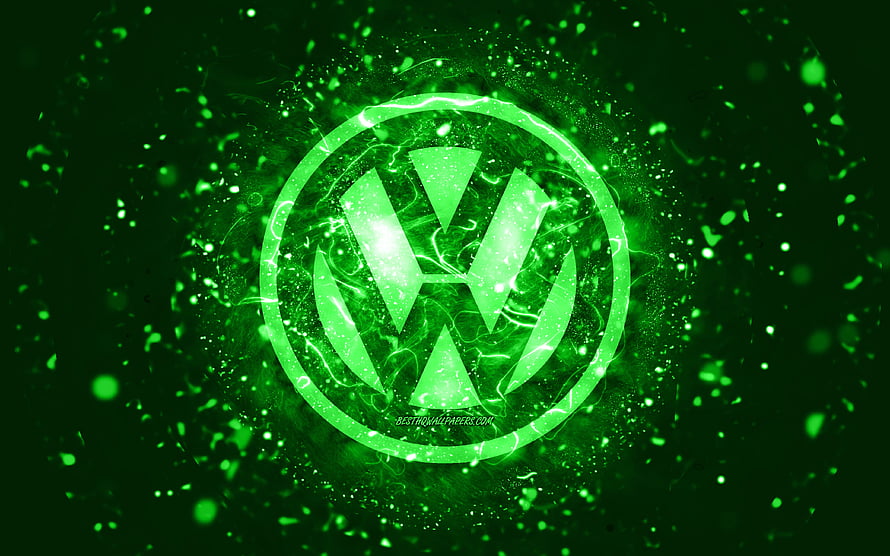 Volkswagen emblem glowing in vibrant green neon with abstract particle effects and electric energy HD wallpaper